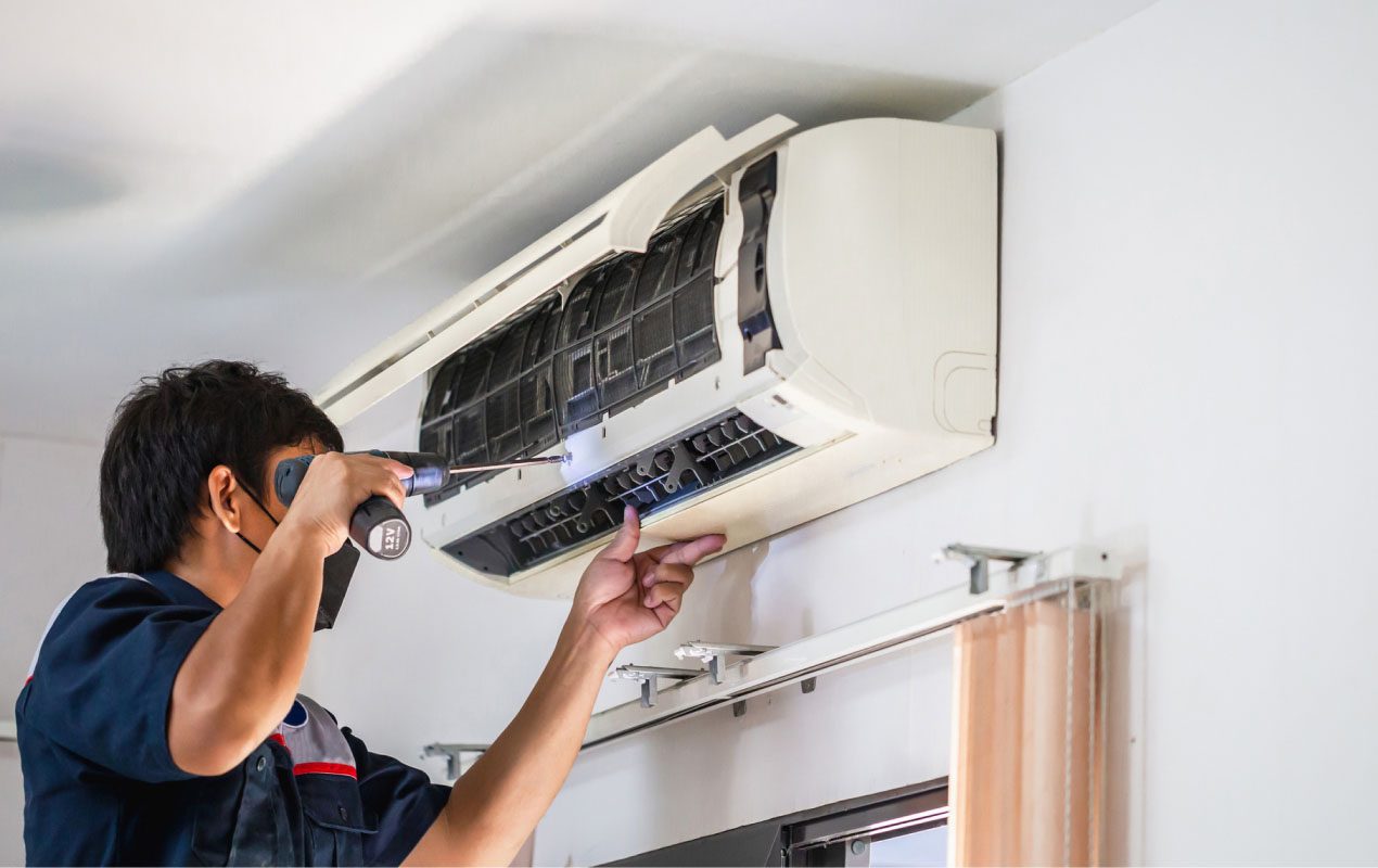 AceComfort technician diagnosing ductless AC issue Vancouver